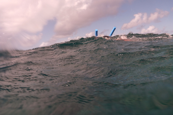 A snorkeller over the waves