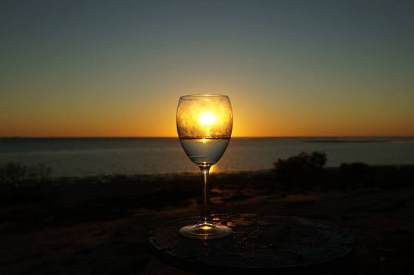 Now this is how sunset should be enjoyed - with a class of wine. Karumba Point is the best place to view the sunset in Gulf Country.